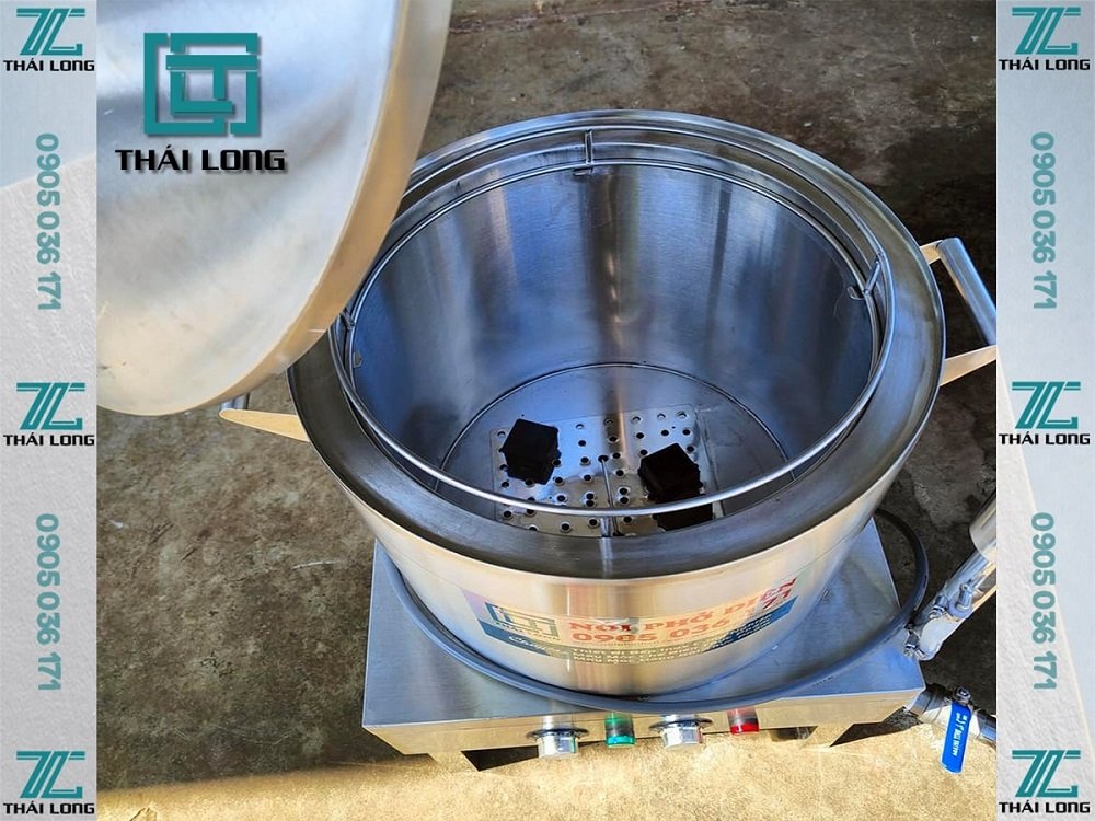 Bên trong nồi tráng bánh cuốn bằng điện